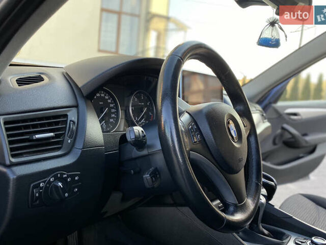Синий БМВ Х1, объемом двигателя 2 л и пробегом 300 тыс. км за 8899 $, фото 62 на Automoto.ua