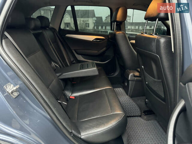Синій БМВ Х1, об'ємом двигуна 2 л та пробігом 297 тис. км за 11499 $, фото 26 на Automoto.ua