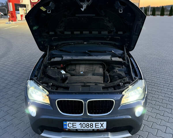Синий БМВ Х1, объемом двигателя 2 л и пробегом 297 тыс. км за 11700 $, фото 52 на Automoto.ua