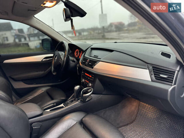 Синій БМВ Х1, об'ємом двигуна 2 л та пробігом 297 тис. км за 11499 $, фото 27 на Automoto.ua