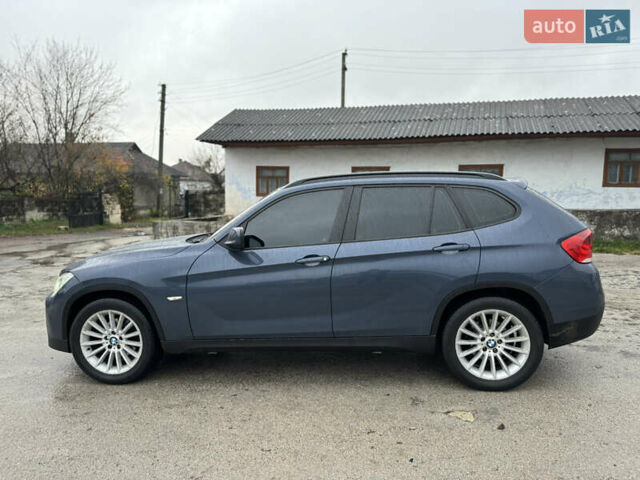 Синій БМВ Х1, об'ємом двигуна 2 л та пробігом 297 тис. км за 11499 $, фото 3 на Automoto.ua