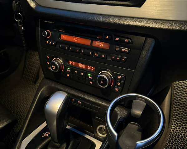 Синий БМВ Х1, объемом двигателя 2 л и пробегом 297 тыс. км за 11700 $, фото 47 на Automoto.ua