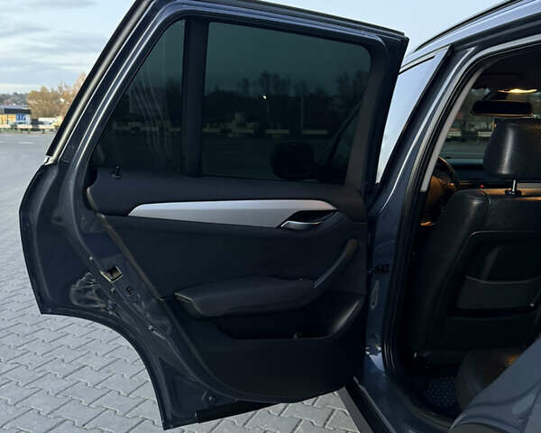 Синий БМВ Х1, объемом двигателя 2 л и пробегом 297 тыс. км за 11700 $, фото 32 на Automoto.ua