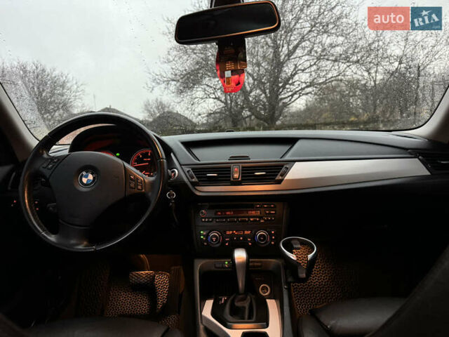 Синій БМВ Х1, об'ємом двигуна 2 л та пробігом 297 тис. км за 11499 $, фото 28 на Automoto.ua