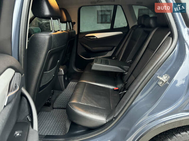 Синій БМВ Х1, об'ємом двигуна 2 л та пробігом 297 тис. км за 11499 $, фото 20 на Automoto.ua