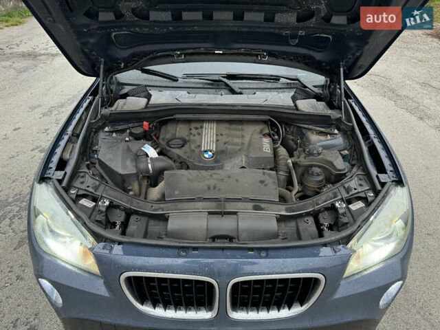 Синій БМВ Х1, об'ємом двигуна 2 л та пробігом 297 тис. км за 11499 $, фото 36 на Automoto.ua
