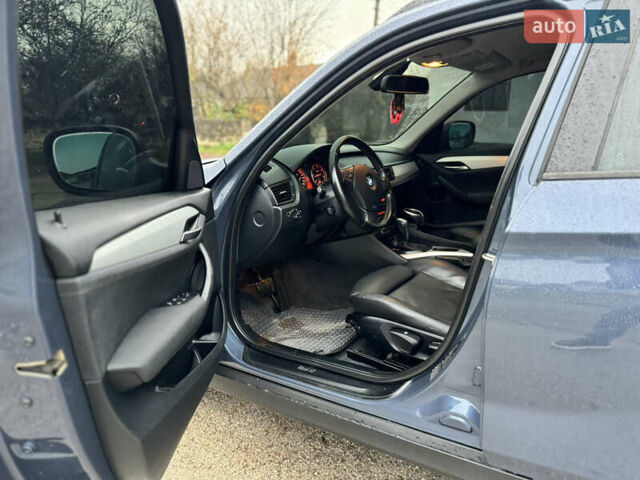 Синій БМВ Х1, об'ємом двигуна 2 л та пробігом 297 тис. км за 11499 $, фото 14 на Automoto.ua