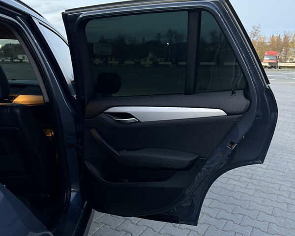 Синий БМВ Х1, объемом двигателя 2 л и пробегом 297 тыс. км за 11700 $, фото 35 на Automoto.ua