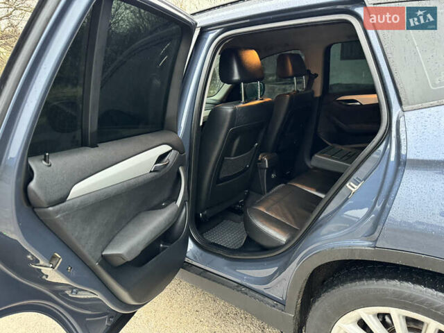 Синій БМВ Х1, об'ємом двигуна 2 л та пробігом 297 тис. км за 11499 $, фото 19 на Automoto.ua