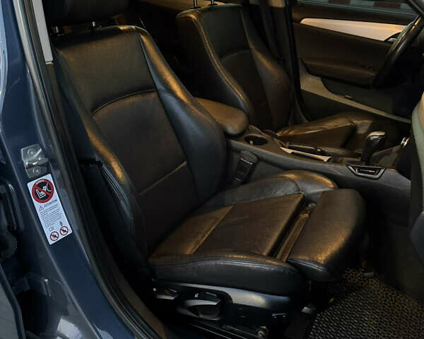 Синий БМВ Х1, объемом двигателя 2 л и пробегом 297 тыс. км за 11700 $, фото 42 на Automoto.ua