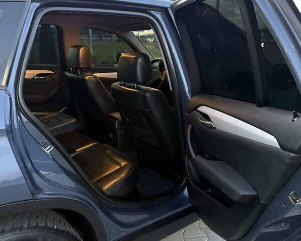 Синий БМВ Х1, объемом двигателя 2 л и пробегом 297 тыс. км за 11700 $, фото 36 на Automoto.ua