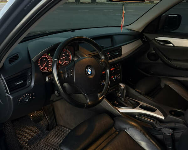 Синий БМВ Х1, объемом двигателя 2 л и пробегом 297 тыс. км за 11700 $, фото 28 на Automoto.ua