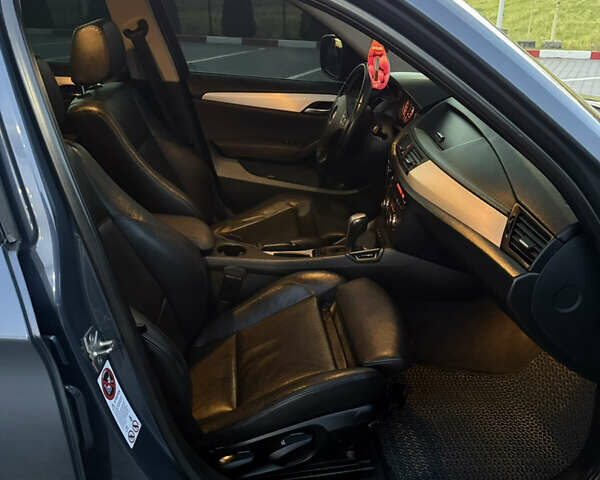 Синий БМВ Х1, объемом двигателя 2 л и пробегом 297 тыс. км за 11700 $, фото 40 на Automoto.ua