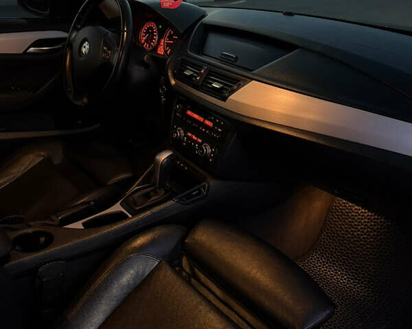 Синий БМВ Х1, объемом двигателя 2 л и пробегом 297 тыс. км за 11700 $, фото 41 на Automoto.ua