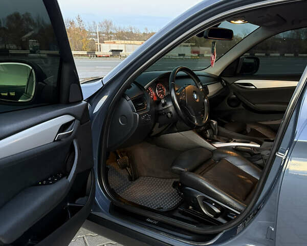 Синий БМВ Х1, объемом двигателя 2 л и пробегом 297 тыс. км за 11700 $, фото 27 на Automoto.ua