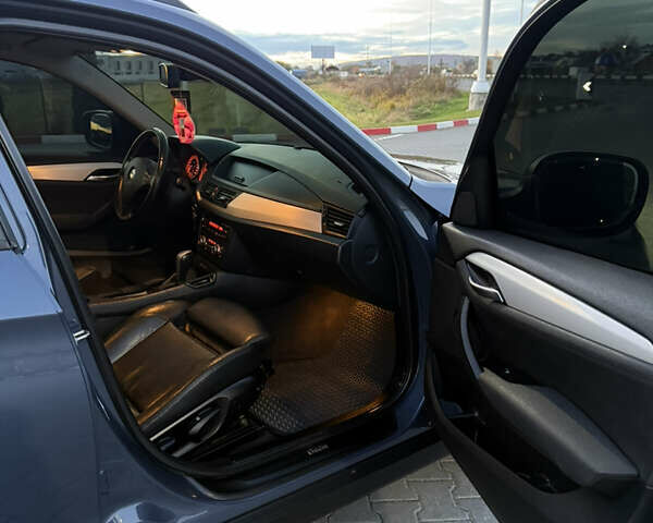 Синий БМВ Х1, объемом двигателя 2 л и пробегом 297 тыс. км за 11700 $, фото 39 на Automoto.ua