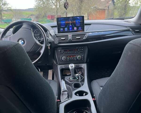 Синий БМВ Х1, объемом двигателя 2 л и пробегом 230 тыс. км за 12900 $, фото 27 на Automoto.ua