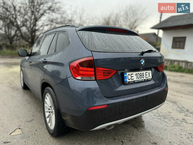 Синій БМВ Х1, об'ємом двигуна 2 л та пробігом 297 тис. км за 11499 $, фото 5 на Automoto.ua