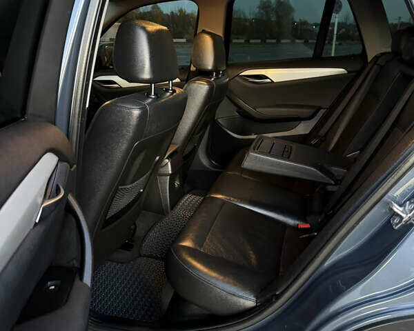 Синий БМВ Х1, объемом двигателя 2 л и пробегом 297 тыс. км за 11700 $, фото 34 на Automoto.ua