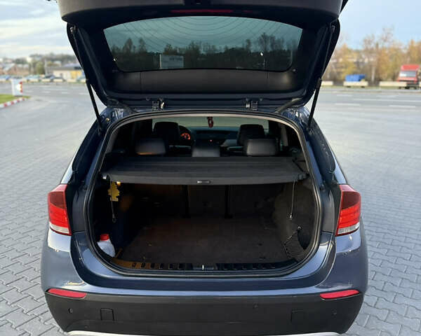 Синий БМВ Х1, объемом двигателя 2 л и пробегом 297 тыс. км за 11700 $, фото 50 на Automoto.ua