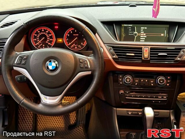 Синий БМВ Х1, объемом двигателя 3 л и пробегом 201 тыс. км за 12000 $, фото 9 на Automoto.ua