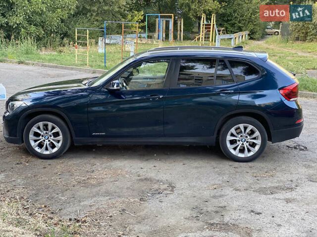 Синий БМВ Х1, объемом двигателя 2 л и пробегом 155 тыс. км за 12900 $, фото 1 на Automoto.ua