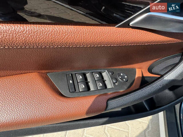 БМВ Х1 2012 в Львове на Automoto.ua Синий БМВ Х1, объемом двигателя 2 л и пробегом 142 тыс. км за 13800 $, фото 14 на Automoto.ua