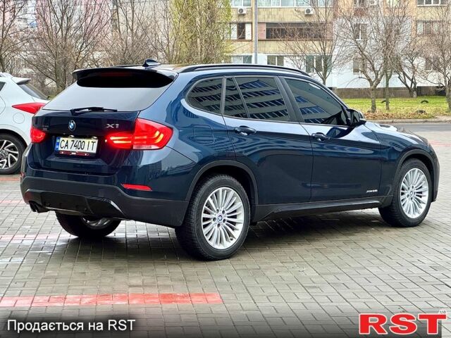 Синий БМВ Х1, объемом двигателя 3 л и пробегом 201 тыс. км за 12000 $, фото 4 на Automoto.ua