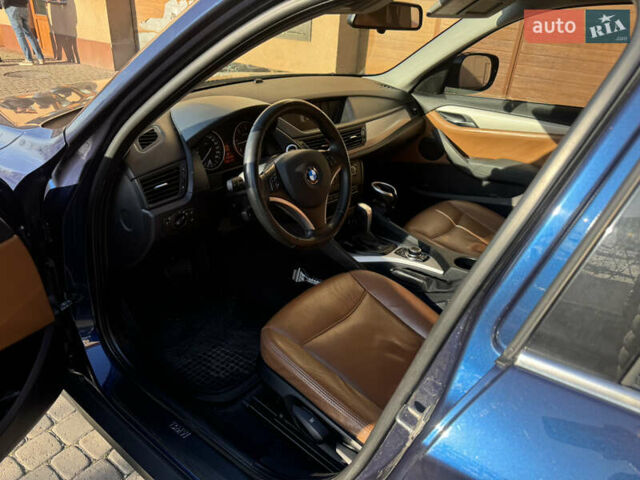 Синій БМВ Х1, об'ємом двигуна 2 л та пробігом 269 тис. км за 10900 $, фото 17 на Automoto.ua