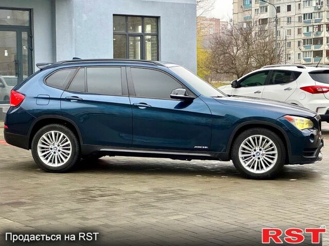 Синий БМВ Х1, объемом двигателя 3 л и пробегом 201 тыс. км за 12000 $, фото 3 на Automoto.ua