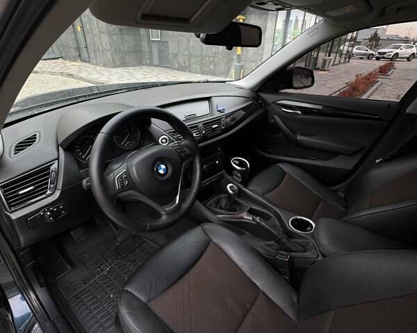 Синий БМВ Х1, объемом двигателя 2 л и пробегом 290 тыс. км за 10900 $, фото 14 на Automoto.ua