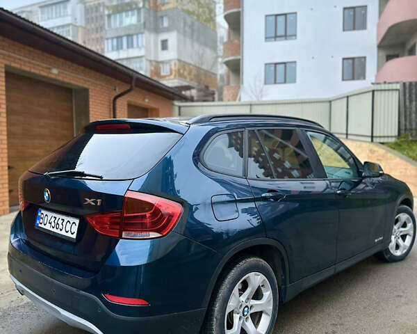 Синій БМВ Х1, об'ємом двигуна 2 л та пробігом 253 тис. км за 12700 $, фото 4 на Automoto.ua