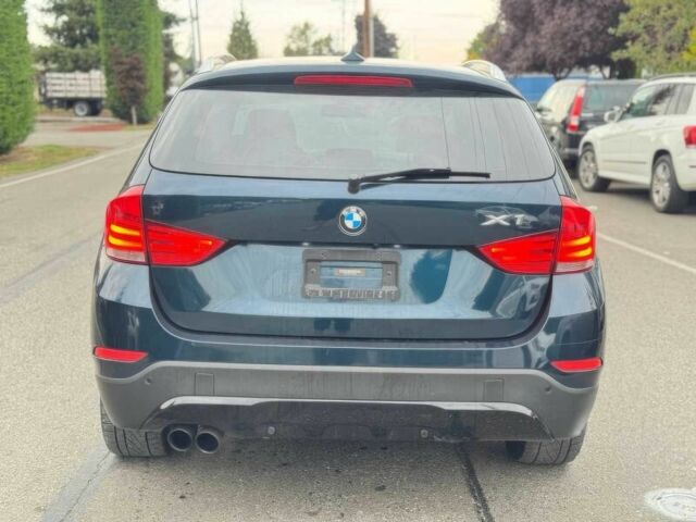 Синий БМВ Х1, объемом двигателя 3 л и пробегом 90 тыс. км за 8000 $, фото 4 на Automoto.ua