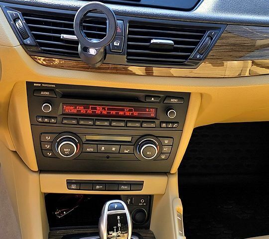 Синій БМВ Х1, об'ємом двигуна 2 л та пробігом 86 тис. км за 14500 $, фото 4 на Automoto.ua