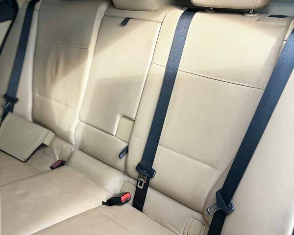 Синій БМВ Х1, об'ємом двигуна 2 л та пробігом 211 тис. км за 12000 $, фото 17 на Automoto.ua