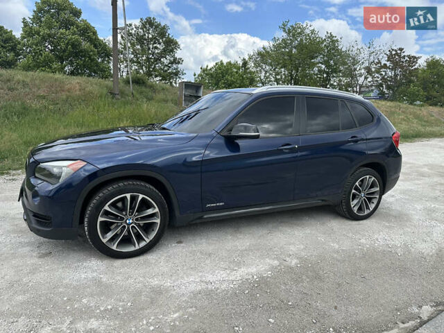 Синій БМВ Х1, об'ємом двигуна 2 л та пробігом 129 тис. км за 11999 $, фото 3 на Automoto.ua