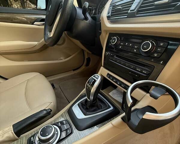 Синий БМВ Х1, объемом двигателя 2 л и пробегом 150 тыс. км за 13880 $, фото 16 на Automoto.ua