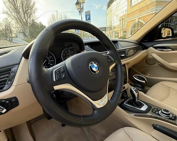 Синий БМВ Х1, объемом двигателя 2 л и пробегом 150 тыс. км за 13880 $, фото 23 на Automoto.ua