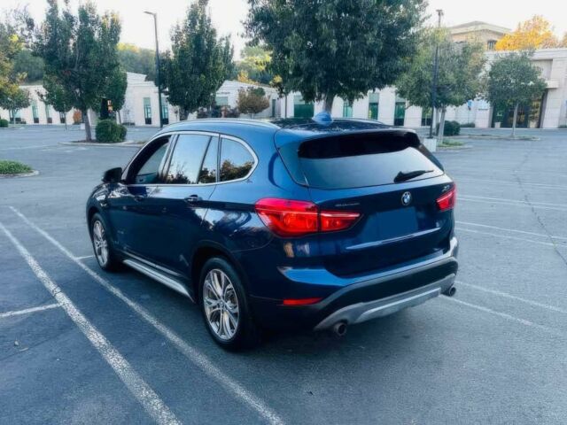 Синий БМВ Х1, объемом двигателя 2 л и пробегом 73 тыс. км за 12600 $, фото 5 на Automoto.ua