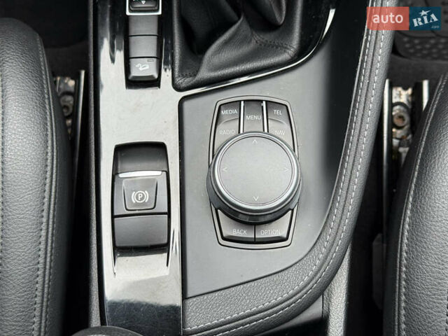 Синий БМВ Х1, объемом двигателя 2 л и пробегом 235 тыс. км за 15500 $, фото 50 на Automoto.ua