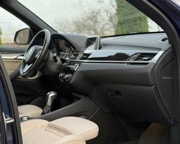 Синій БМВ Х1, об'ємом двигуна 2 л та пробігом 145 тис. км за 16350 $, фото 48 на Automoto.ua