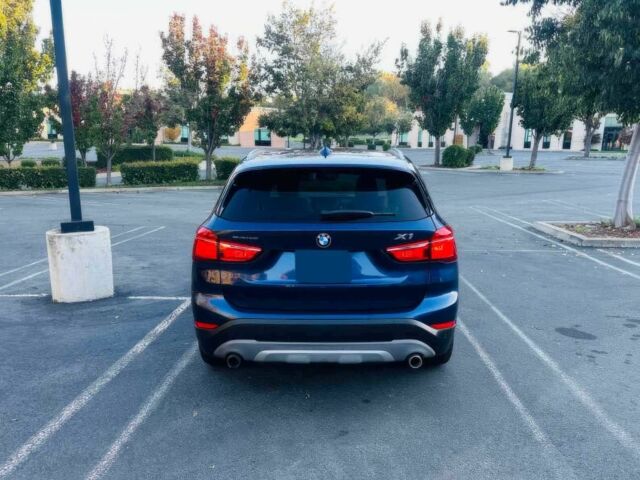 Синий БМВ Х1, объемом двигателя 2 л и пробегом 73 тыс. км за 12600 $, фото 4 на Automoto.ua