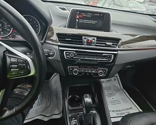 Синий БМВ Х1, объемом двигателя 2 л и пробегом 142 тыс. км за 4500 $, фото 5 на Automoto.ua