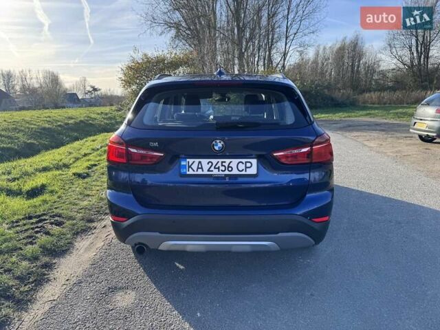 Синий БМВ Х1, объемом двигателя 2 л и пробегом 125 тыс. км за 23388 $, фото 3 на Automoto.ua