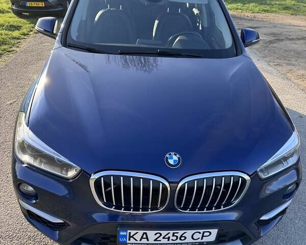 Синий БМВ Х1, объемом двигателя 2 л и пробегом 125 тыс. км за 23388 $, фото 4 на Automoto.ua