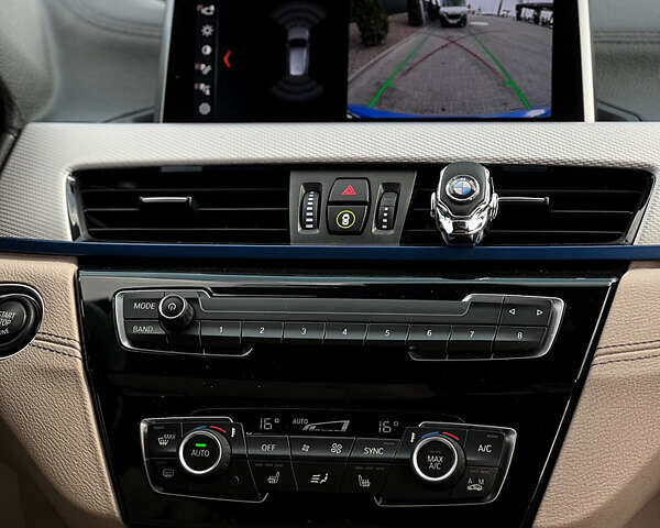 Синій БМВ Х1, об'ємом двигуна 2 л та пробігом 62 тис. км за 25999 $, фото 25 на Automoto.ua