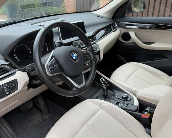 Синий БМВ Х1, объемом двигателя 1.5 л и пробегом 52 тыс. км за 29900 $, фото 2 на Automoto.ua