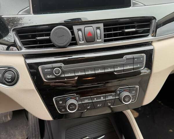 Синий БМВ Х1, объемом двигателя 1.5 л и пробегом 52 тыс. км за 29900 $, фото 4 на Automoto.ua