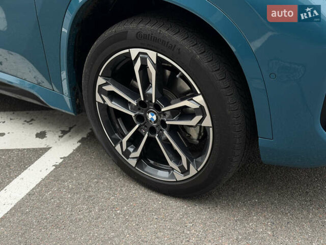 Синий БМВ Х1, объемом двигателя 2 л и пробегом 13 тыс. км за 40799 $, фото 2 на Automoto.ua