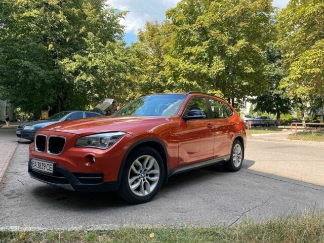 Оранжевый БМВ Х1, объемом двигателя 2 л и пробегом 236 тыс. км за 14000 $, фото 1 на Automoto.ua